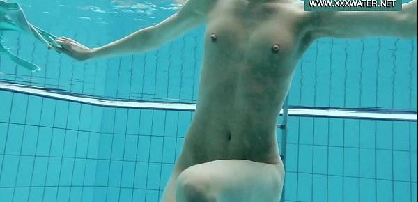 Podvodkova swimming in blue bikini in the pool